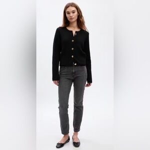 GAP knit black lady jacket with gold buttons and front pockets.
Medium. EUC.